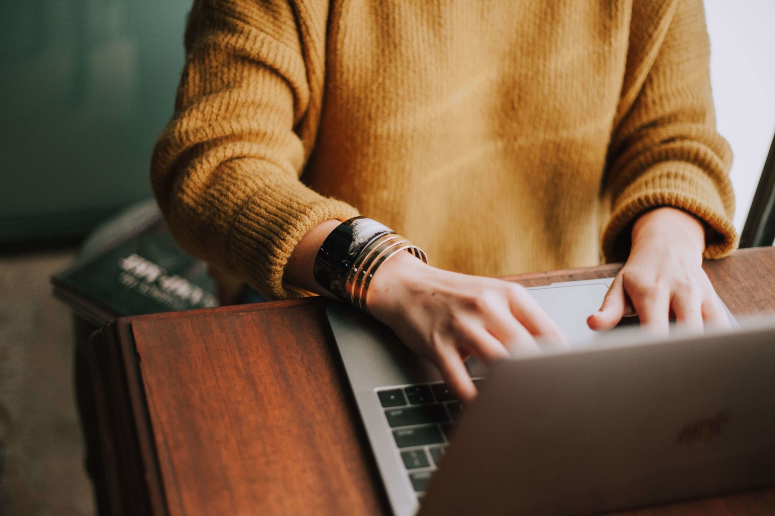 adult degree program student on computer